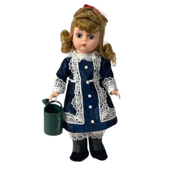 Madame Alexander 8" restrung Renoir's Girl With Watering Can doll with stand.